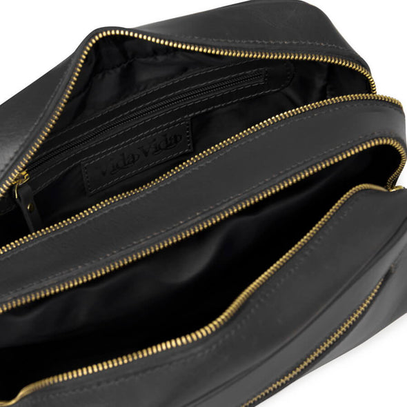 Inside view of black leather wash bag