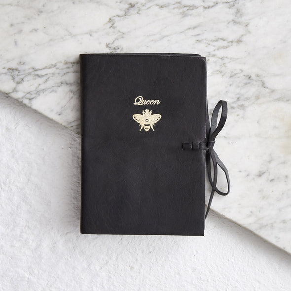 Black embossed leather notebook