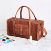 Vintage brown tan leather duffel bag square end