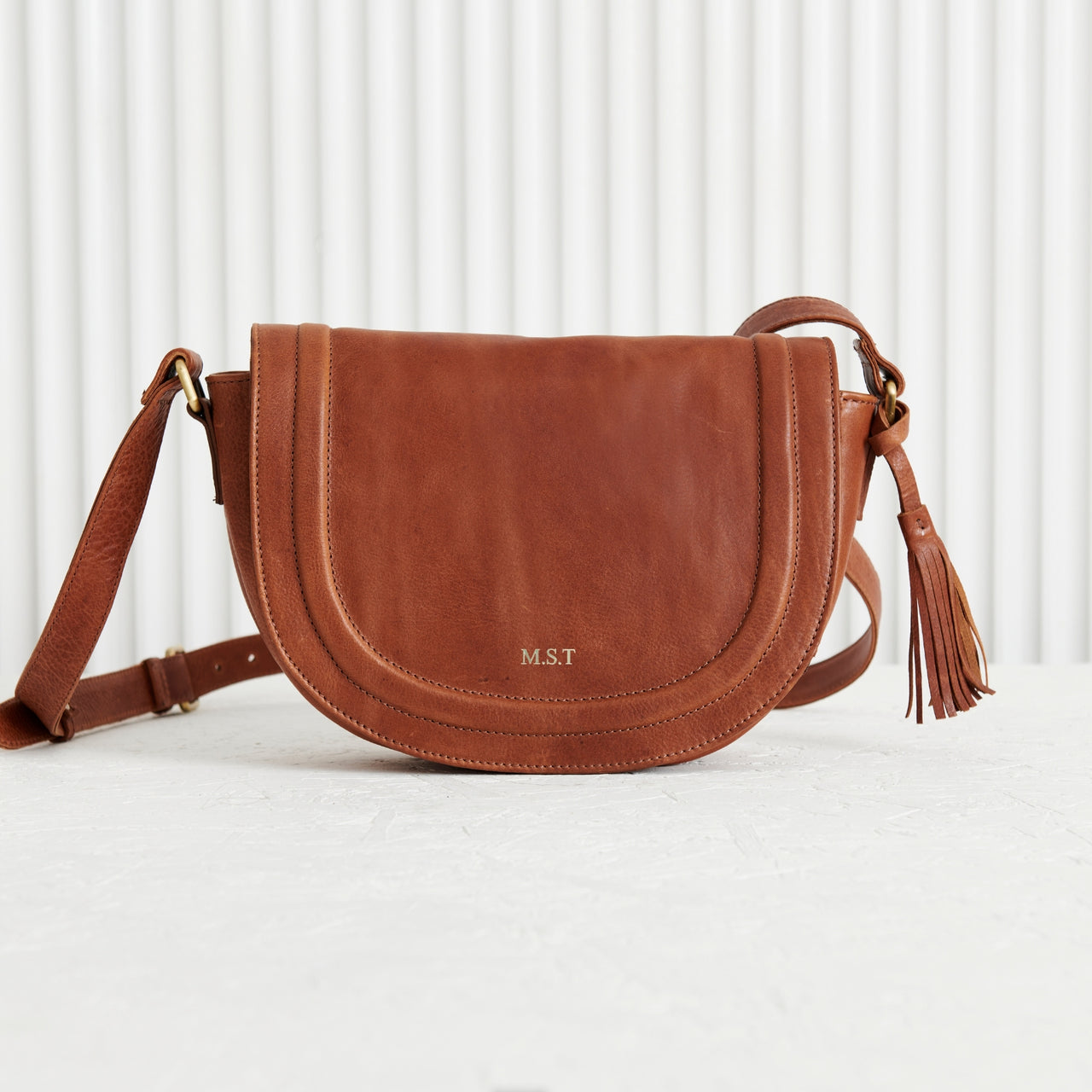 Soft Luxury Leather Saddle Bag with Tassel