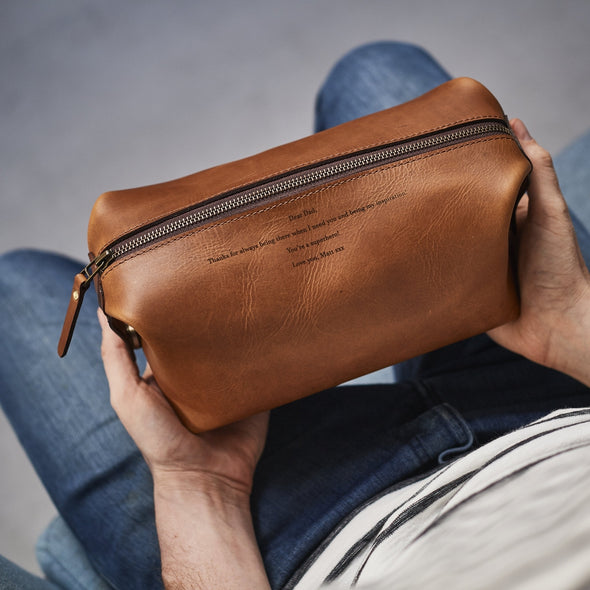 Brown leather washbag with personalised message