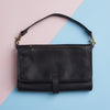Black leather baby changing bag with mat