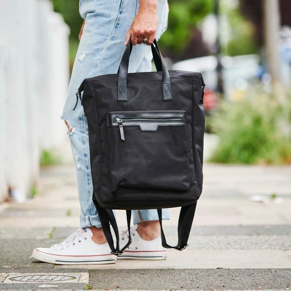 Leather Trim Top Zip Backpack