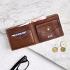 Coin section wallet in raw tan leather