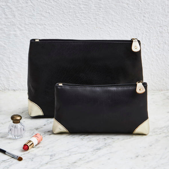 Matching leather wash bag and make up bag black and gold