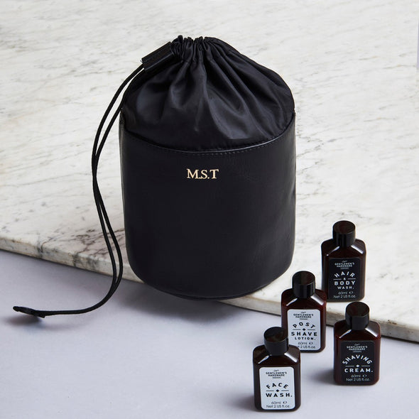 Black leather drawstring wash bag with initials and travel set