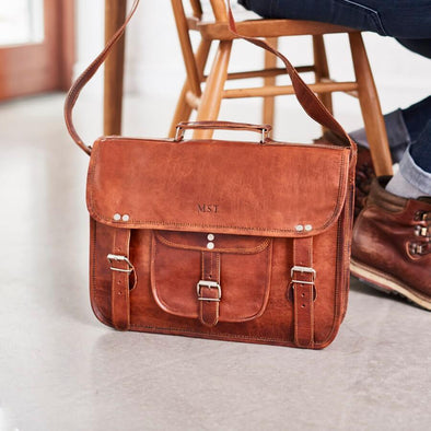 Personalised leather satchel in tan with front pocket and handle