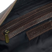 Inside of dark brown leather wash bag
