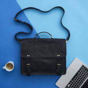 Black leather laptop bag styled