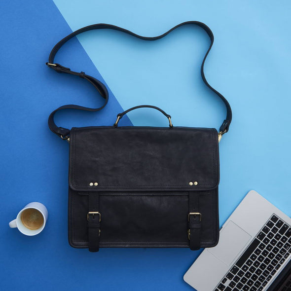 Black leather laptop bag styled
