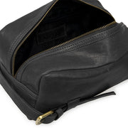 Inside black leather washbag