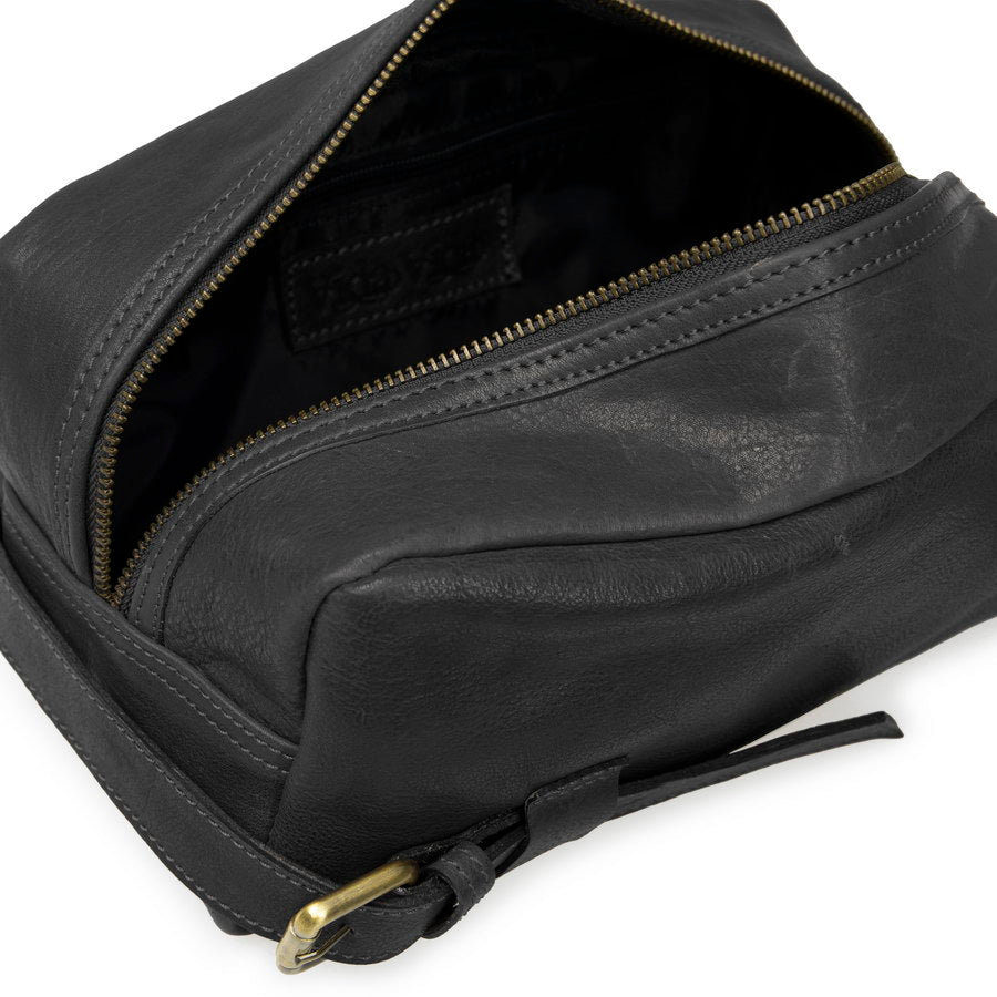 Inside black leather washbag