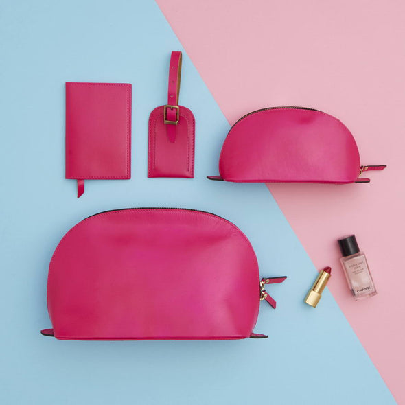 Bright pink ladies leather travel set makeup bag and more