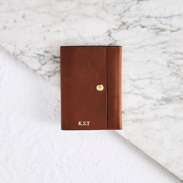 Tan leather passport holder