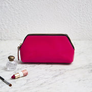 Metalic pink clutch bag with name