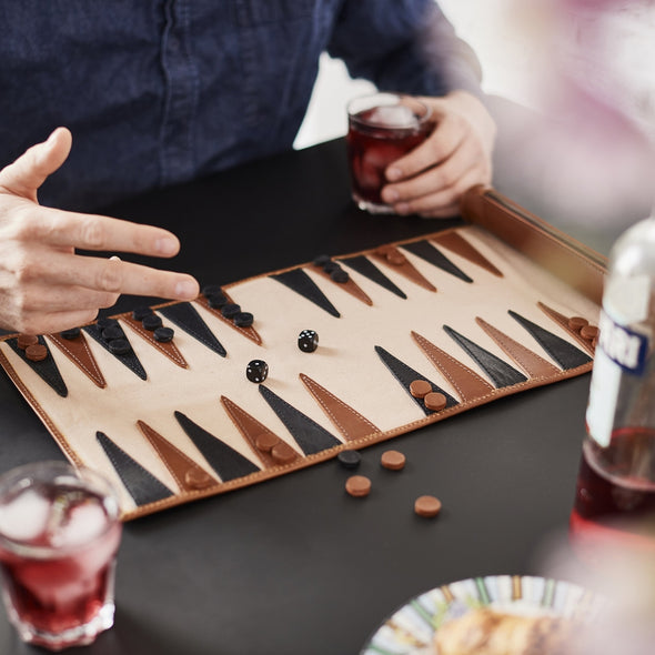 Travel backgammon set in dark tan leather