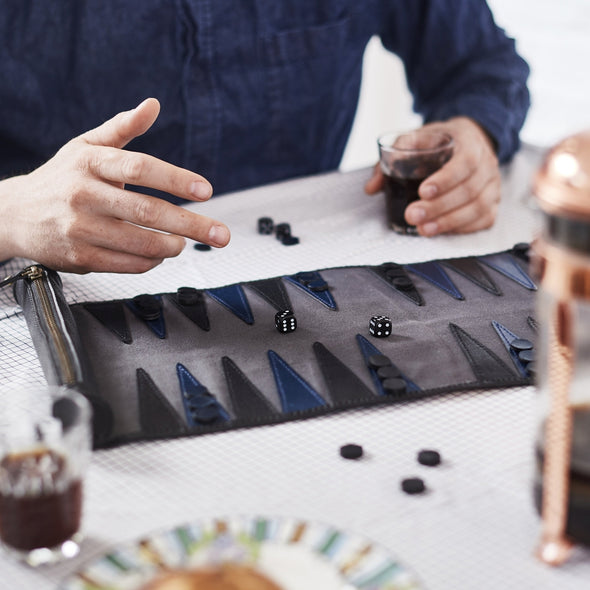 black leather travel backgammon set