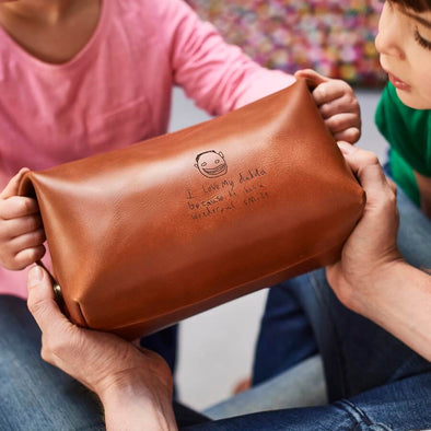 Leather washbag in tan brown with kids drawing laser engraved