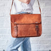 Tan leather shoulder bag with handle laptop bag