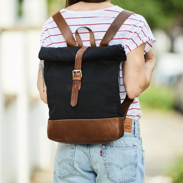 Roll top canvas and leather backpack in black and tan for men