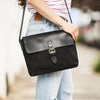 Womens leather and canvas messenger bag in black