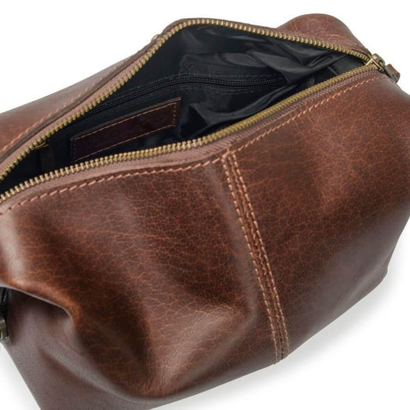 Inside of leather wash bag in brown