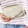 Womens makeup bag in gold with tasel