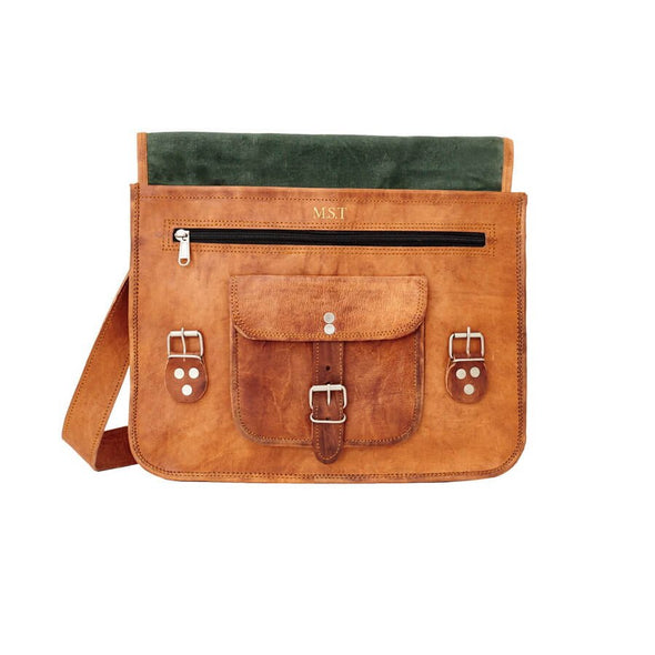 Satchel with front pocket and handle embossing position under front flap