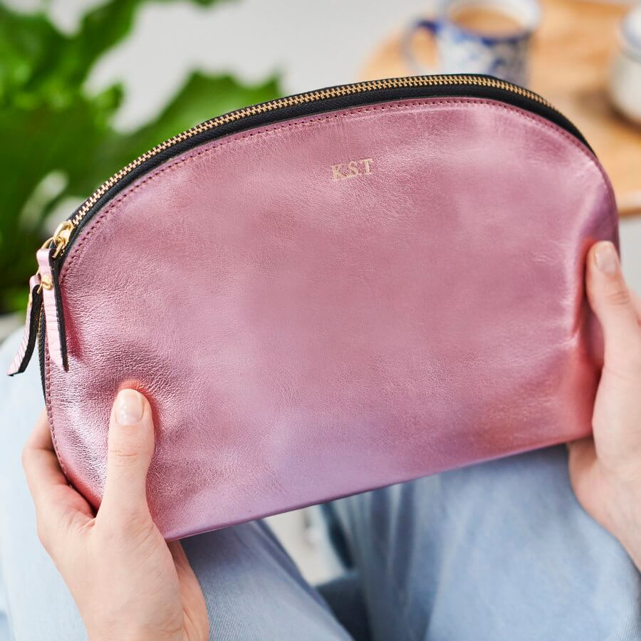 Luna leather wash bag in metalic pink