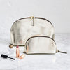 Metalic gold make up and wash bag set in leather
