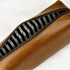 Inside pencil case in brown leather with striped lining