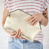 Gold leather clutch bag with personalised message