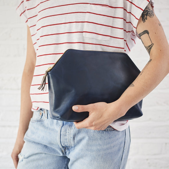 Navy leather clutch bag
